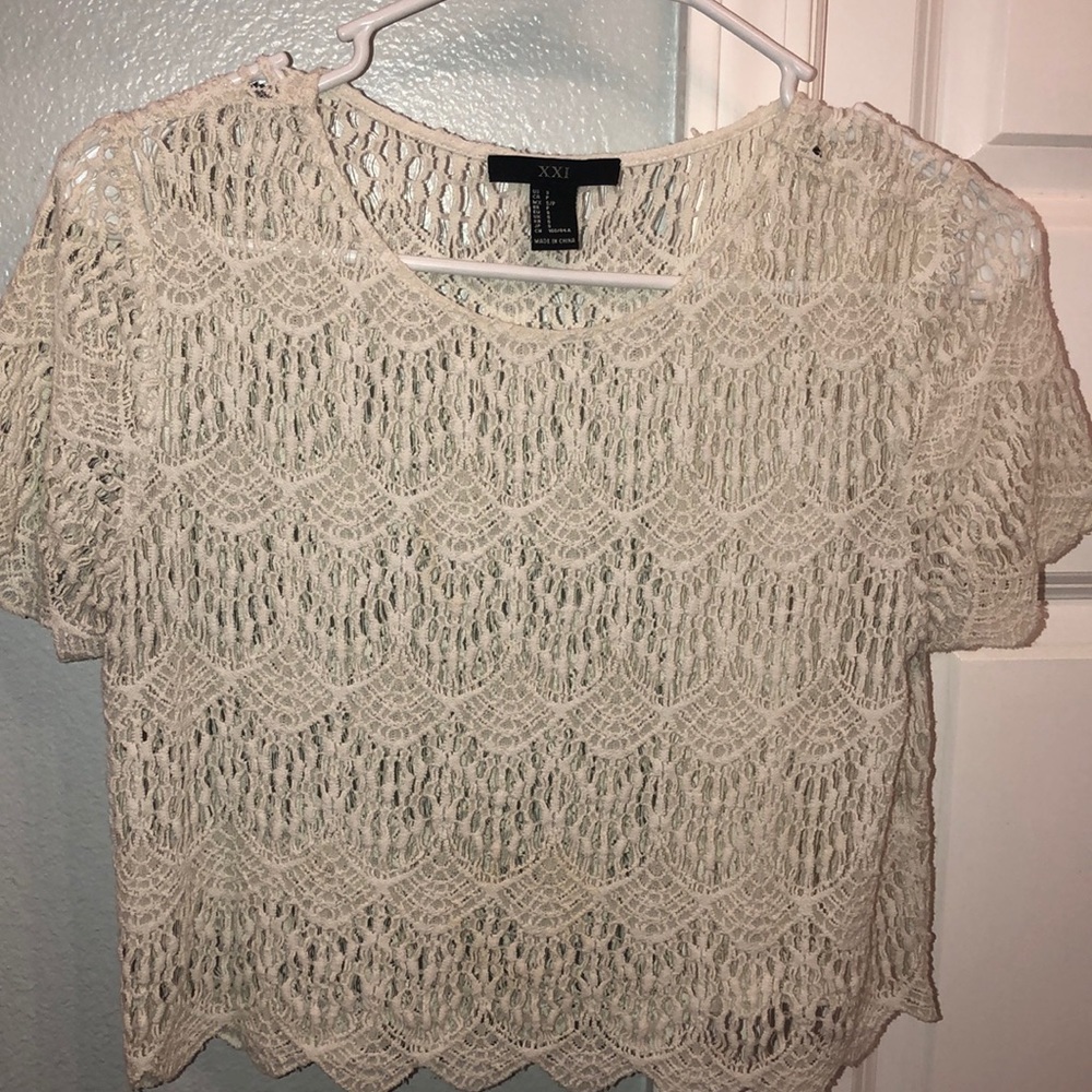 Cream fringe layering top